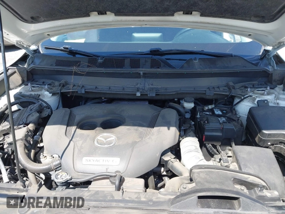 2020 Mazda CX-9 Sport with VIN JM3TCABY1L0406720, listed as a IAAI auction lot 42304144 with 75,887 mi miles and . Bid and sale history available at DreamBid. Image 10.