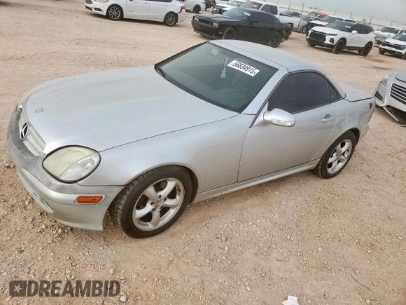 2001 Mercedes-Benz SLK 230/320 z VIN WDBKK65F91F228336, wystawiony jako Copart lot #56834915 z przebiegiem 127 224 mil mil oraz Szkoda całkowita • Salvage title. Historia ofert i sprzedaży dostępna na DreamBid. Obrazek 1.