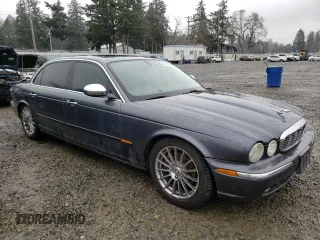 2005 Jaguar XJ VDP with VIN SAJWA82C15SG43017, listed as a Copart auction lot 83910874 with 83,352 mi miles and Salvage Title. Bid and sale history available at carsss.com. Image 4.