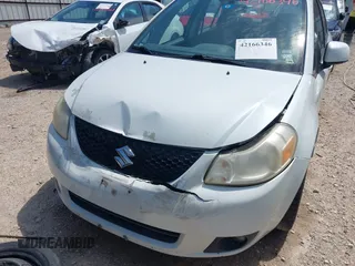 2008 Suzuki SX4 Touring 2 z VIN JS2YC417285100960, wystawiony jako IAAI lot #42166346 z przebiegiem 162 498 mil mil oraz . Historia ofert i sprzedaży dostępna na DreamBid. Obrazek 6.