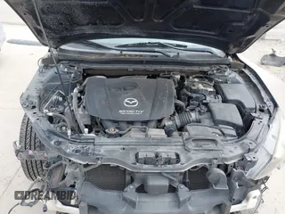 2014 Mazda 3 i Touring with VIN JM1BM1V76E1113185, listed as a IAAI auction lot 41610966 with 77,697 mi miles and . Bid and sale history available at DreamBid. Image 10.