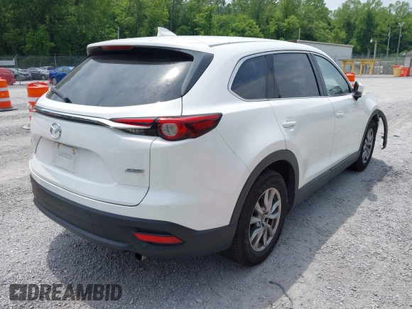 2016 Mazda CX-9 Touring с VIN JM3TCBCY1G0116889, выставлен на аукционе IAAI как лот 42394821 с пробегом 210 861 миль миль и . История ставок и продаж доступна на DreamBid. Изображение 4.