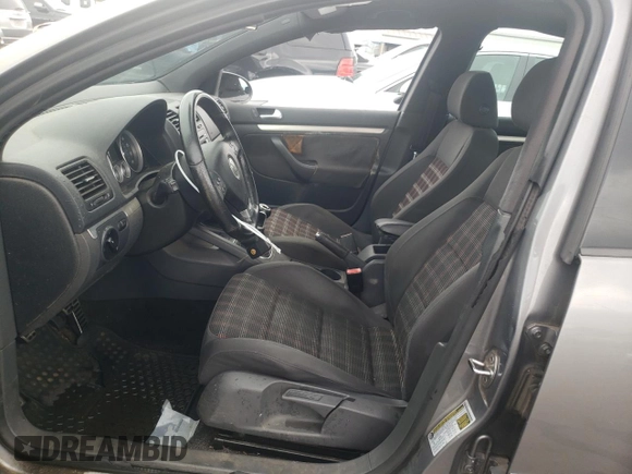 2009 Volkswagen GTI z VIN WVWGD71K69W063268, wystawiony jako Copart lot #66230814 z przebiegiem 121 471 mil mil oraz Czysty tytuł • Clean title. Historia ofert i sprzedaży dostępna na DreamBid. Obrazek 7.