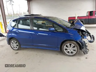 2009 Honda Fit Sport with VIN JHMGE88459C001743, listed as a IAAI auction lot 41852048 with 128,225 mi miles. Bid and sale history available at carsss.com. Image 14.