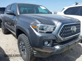 2018 Toyota Tacoma SR with VIN 5TFCZ5AN6JX127774, listed as a IAAI auction lot 41801158 with 28,161 mi miles and . Bid and sale history available at DreamBid. Image 19.