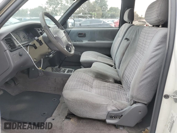 1995 Toyota T100 SR5 with VIN JT4VD12F8S0007489, listed as a Copart auction lot 82177794 with 290,145 mi miles and Clean Title. Bid and sale history available at DreamBid. Image 7.