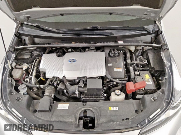 2021 Toyota Prius L Eco z VIN JTDKAMFU0M3140335, wystawiony jako Copart lot #61955845 z przebiegiem 96 071 mil mil oraz Czysty tytuł • Clean title. Historia ofert i sprzedaży dostępna na DreamBid. Obrazek 11.