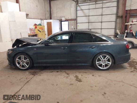 2016 Audi A6 2.0T Premium Plus with VIN WAUGFAFC8GN088505, listed as a IAAI auction lot 41569043 with 98,528 mi miles. Bid and sale history available at carsss.com. Image 15.