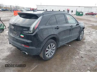 2021 Cadillac XT4 AWD Sport with VIN 1GYFZFR49MF065225, listed as a IAAI auction lot 41191994 with 58,095 mi miles and . Bid and sale history available at DreamBid. Image 4.
