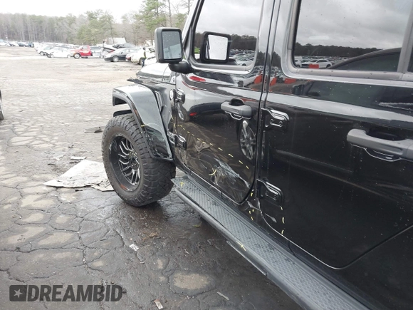 2022 Jeep Gladiator High Altitude z VIN 1C6HJTFG1NL164764, wystawiony jako IAAI lot #41727357 z przebiegiem 28 222 mil mil oraz . Historia ofert i sprzedaży dostępna na DreamBid. Obrazek 17.