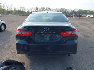 2020 Toyota Camry LE with VIN 4T1C11AK2LU393699, listed as a IAAI auction lot 42123267 with 66,932 mi miles and . Bid and sale history available at carsss.com. Image 17.