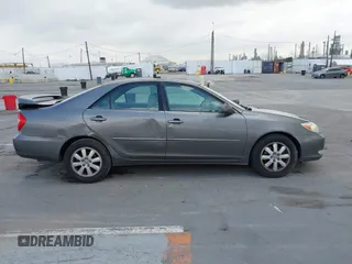 2004 Toyota Camry LE with VIN 4T1BF32K84U588764, listed as a IAAI auction lot 42126345 with 144,642 mi miles. Bid and sale history available at carsss.com. Image 13.