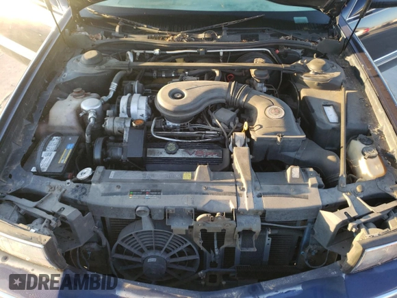 1994 Cadillac DeVille z VIN 1G6KD52B3RU283575, wystawiony jako Copart lot #73576044 z przebiegiem 133 977 mil mil oraz Czysty tytuł • Clean title. Historia ofert i sprzedaży dostępna na DreamBid. Obrazek 11.
