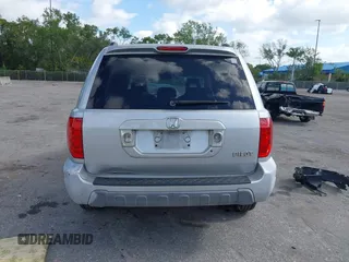 2003 Honda Pilot EX with VIN 2HKYF18603H504829, listed as a IAAI auction lot 42083247 with 247,429 mi miles and . Bid and sale history available at carsss.com. Image 16.