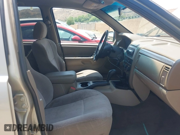 2001 Jeep Grand Cherokee Laredo with VIN 1J4GX48S01C606559, listed as a IAAI auction lot 42384286 with 149,146 mi miles and . Bid and sale history available at DreamBid. Image 5.