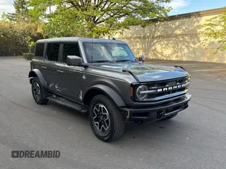 2022 Ford Bronco with VIN 1FMEE5DP5NLB24049, listed as a Copart auction lot 56769875 with 20,710 mi miles and Salvage Title. Bid and sale history available at DreamBid. Image 1.
