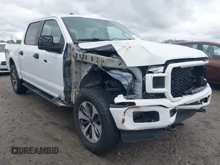 2019 Ford F-150 XL with VIN 1FTEW1E58KFC77008, listed as a IAAI auction lot 42013589 with 186,349 mi miles and . Bid and sale history available at DreamBid. Image 1.