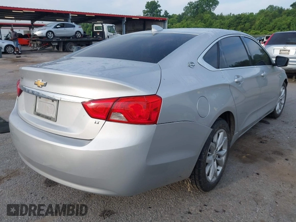 2017 Chevrolet Impala LT with VIN 2G1105S32H9159346, listed as a IAAI auction lot 39502282 with 105,533 mi miles and . Bid and sale history available at DreamBid. Image 4.