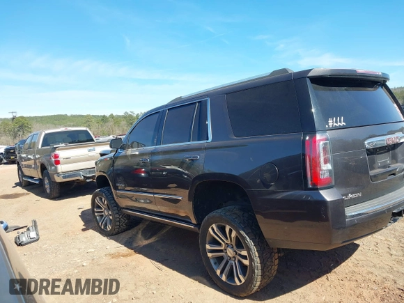 2018 GMC Yukon Denali with VIN 1GKS2CKJ6JR303263, listed as a IAAI auction lot 41633514 with 130,990 mi miles. Bid and sale history available at carsss.com. Image 13.