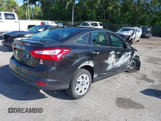 2012 Ford Focus SE with VIN 1FAHP3F22CL150631, listed as a IAAI auction lot 42594823 with 49,456 mi miles and . Bid and sale history available at DreamBid. Image 4.