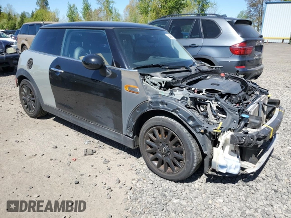 2014 MINI Hardtop with VIN WMWXM5C53ET934213, listed as a Copart auction lot 53663755 with 112,975 mi miles and Clean Title. Bid and sale history available at DreamBid. Image 4.