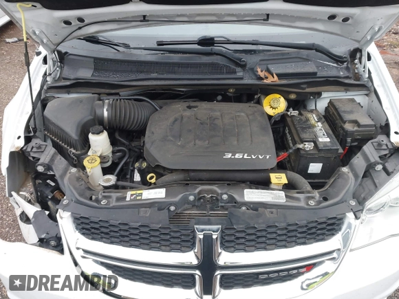 2017 Dodge Grand Caravan SE with VIN 2C4RDGBG9HR824594, listed as a IAAI auction lot 41250877 with 117,588 mi miles and . Bid and sale history available at DreamBid. Image 10.