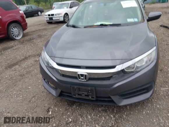 2017 Honda Civic LX z VIN 2HGFC2F54HH527421, wystawiony jako IAAI lot #42329336 z przebiegiem 97 655 mil mil oraz . Historia ofert i sprzedaży dostępna na DreamBid. Obrazek 12.