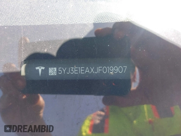 2018 Tesla Model 3 Long Range Battery with VIN 5YJ3E1EAXJF019907, listed as a IAAI auction lot 41995969 with Not Provided miles and . Bid and sale history available at DreamBid. Image 9.