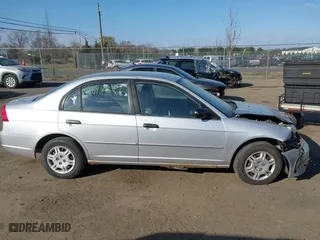 2001 Honda Civic LX with VIN 1HGES16541L057120, listed as a IAAI auction lot 41897827 with 160,715 mi miles. Bid and sale history available at carsss.com. Image 13.