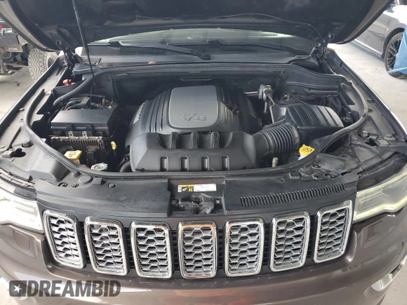 2017 Jeep Grand Cherokee Overland with VIN 1C4RJFCTXHC768687, listed as a Copart auction lot 51442495 with 123,578 mi miles and Clean Title. Bid and sale history available at carsss.com. Image 12.