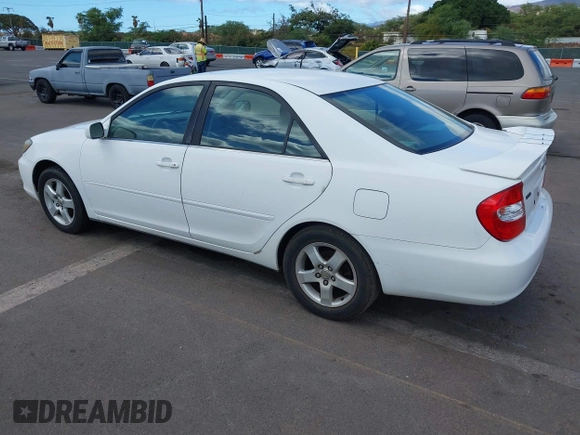 2002 Toyota Camry LE z VIN JTDBE32K020030113, wystawiony jako IAAI lot #41210452 z przebiegiem 190 486 mil mil oraz . Historia ofert i sprzedaży dostępna na DreamBid. Obrazek 3.