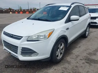 2014 Ford Escape SE with VIN 1FMCU9GX6EUD51032, listed as a IAAI auction lot 42206659 with 131,438 mi miles and . Bid and sale history available at DreamBid. Image 6.