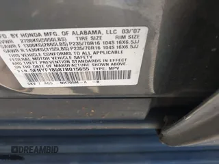 2007 Honda Pilot EX-L with VIN 5FNYF18587B015655, listed as a IAAI auction lot 42485193 with 293,684 mi miles and . Bid and sale history available at DreamBid. Image 9.