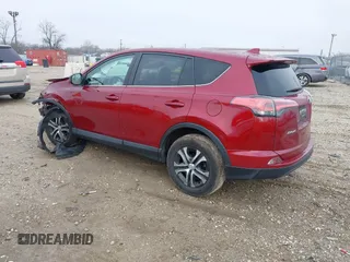 2018 Toyota RAV4 LE with VIN 2T3ZFREV9JW514778, listed as a IAAI auction lot 41202060 with 99,405 mi miles. Bid and sale history available at carsss.com. Image 3.