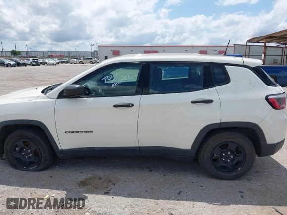 2018 Jeep Compass Sport with VIN 3C4NJCAB3JT263298, listed as a IAAI auction lot 42218194 with 104,604 mi miles and . Bid and sale history available at DreamBid. Image 13.