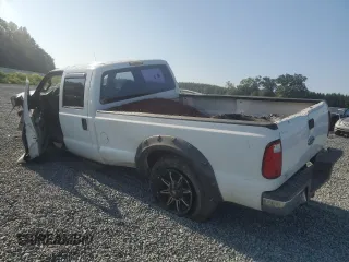 2010 Ford F-250 XL with VIN 1FTSW2A59AEA19292, listed as a Copart auction lot 68735244 with 106,646 mi miles and Salvage title. Bid and sale history available at DreamBid. Image 2.