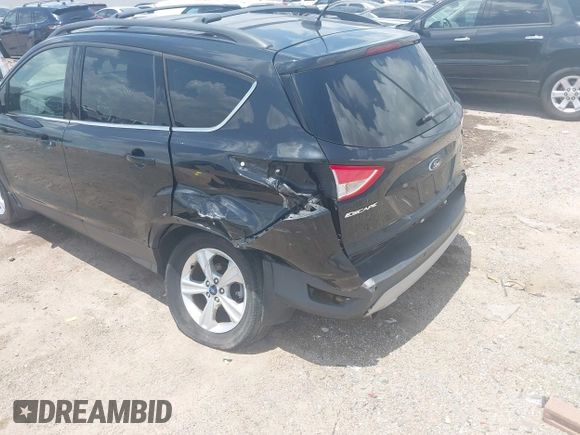 2013 Ford Escape SE with VIN 1FMCU9GX0DUC42483, listed as a IAAI auction lot 42549857 with 138,028 mi miles and . Bid and sale history available at DreamBid. Image 6.