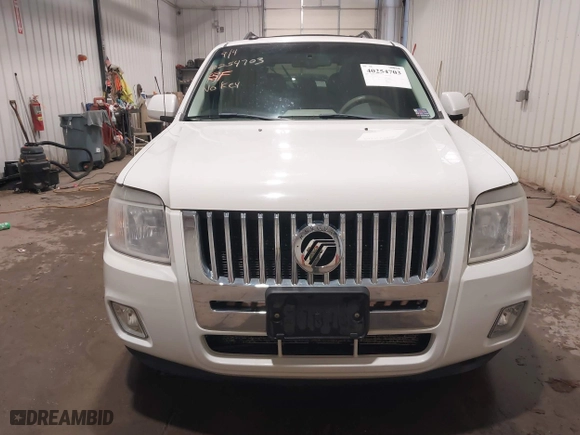 2011 Mercury Mariner Premier with VIN 4M2CN9HG3BKJ02026, listed as a IAAI auction lot 40254703 with 99,000 mi miles. Bid and sale history available at carsss.com. Image 12.