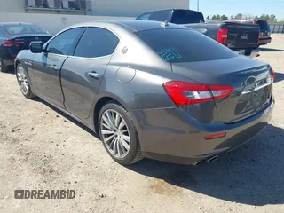 2015 Maserati Ghibli z VIN ZAM57XSA6F1153481, wystawiony jako IAAI lot #41694942 z przebiegiem 74 027 mil mil oraz . Historia ofert i sprzedaży dostępna na DreamBid. Obrazek 3.