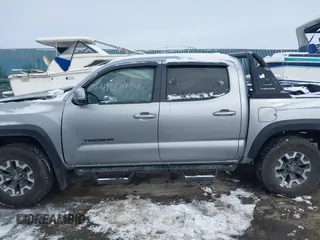 2019 Toyota Tacoma SR z VIN 3TMCZ5AN8KM211246, wystawiony jako IAAI lot #41574346 z przebiegiem 66 825 mil mil oraz . Historia ofert i sprzedaży dostępna na DreamBid. Obrazek 15.