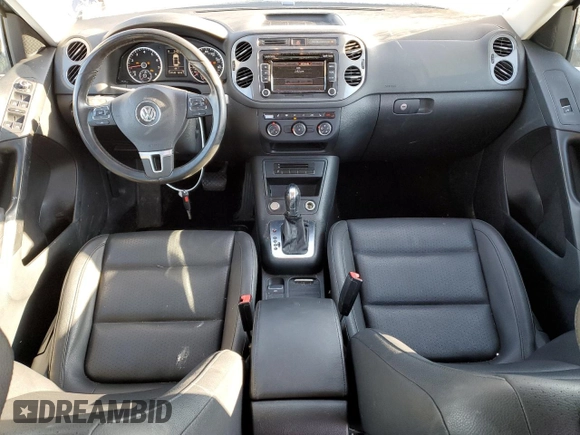 2014 Volkswagen Tiguan SE z VIN WVGAV3AXXEW505398, wystawiony jako Copart lot #41682155 z przebiegiem 137 147 mil mil oraz Nie do naprawy • Non repairable. Historia ofert i sprzedaży dostępna na DreamBid. Obrazek 8.