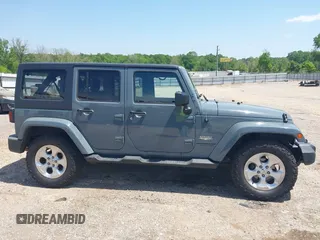 2014 Jeep Wrangler Unlimited Sahara with VIN 1C4BJWEG5EL326980, listed as a IAAI auction lot 42031659 with 116,181 mi miles and . Bid and sale history available at DreamBid. Image 13.