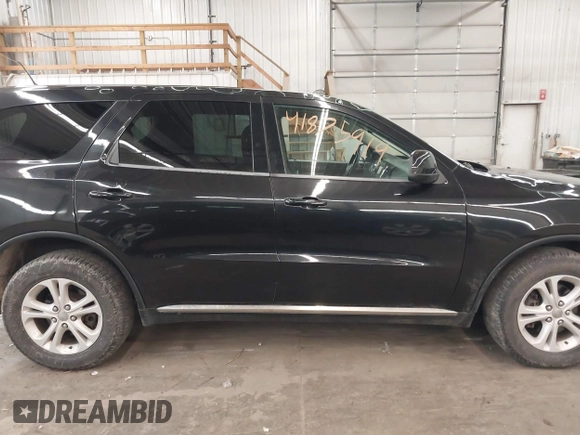 2013 Dodge Durango SXT with VIN 1C4RDJAG0DC512293, listed as a IAAI auction lot 41875919 with 191,128 mi miles and . Bid and sale history available at DreamBid. Image 14.