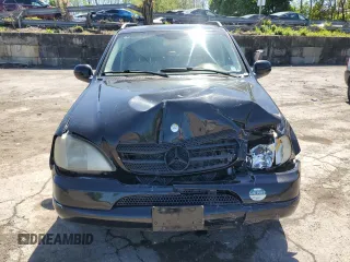 2001 Mercedes-Benz M-Class with VIN 4JGAB54E61A232157, listed as a Copart auction lot 53482584 with 137,549 mi miles and Salvage Title. Bid and sale history available at carsss.com. Image 5.