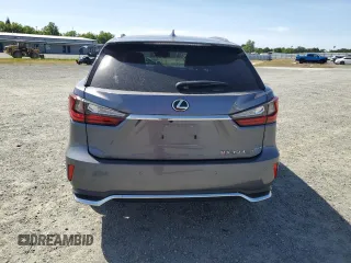 2020 Lexus RX 350L with VIN JTJHZKFA4L2027079, listed as a Copart auction lot 57151485 with 60,890 mi miles and Salvage title. Bid and sale history available at DreamBid. Image 6.
