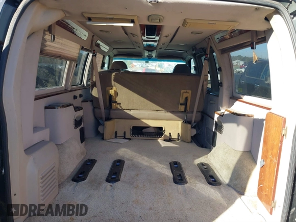 2000 Chevrolet Express Cargo Van w/YF7 with VIN 1GBFG15R6Y1173065, listed as a IAAI auction lot 41357260 with 242,540 mi miles. Bid and sale history available at carsss.com. Image 13.