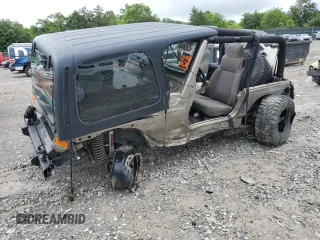 2005 Jeep Wrangler Sport with VIN 1J4FA49SX5P313598, listed as a Copart auction lot 60460535 with 174,418 mi miles and Clean title. Bid and sale history available at DreamBid. Image 1.