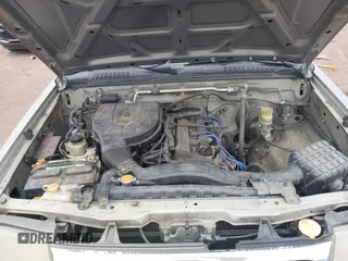 2000 Nissan Frontier XE z VIN 1N6DD21S9YC310558, wystawiony jako IAAI lot #41388581 z przebiegiem Nie podano mil oraz . Historia ofert i sprzedaży dostępna na DreamBid. Obrazek 10.
