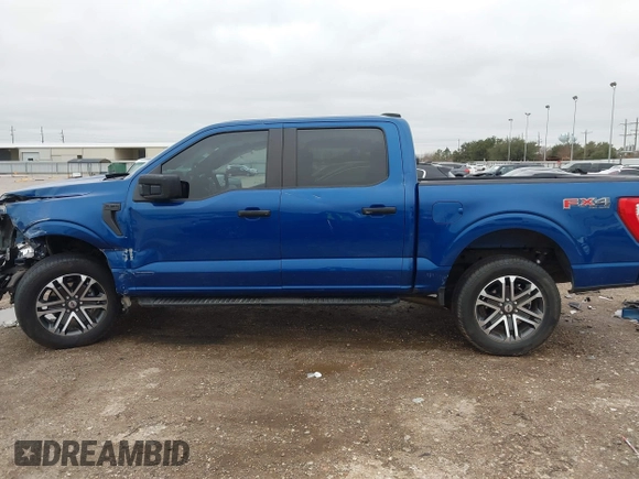 2023 Ford F-150 XL with VIN 1FTEW1EP6PKD00320, listed as a IAAI auction lot 41562733 with 19,468 mi miles. Bid and sale history available at carsss.com. Image 15.