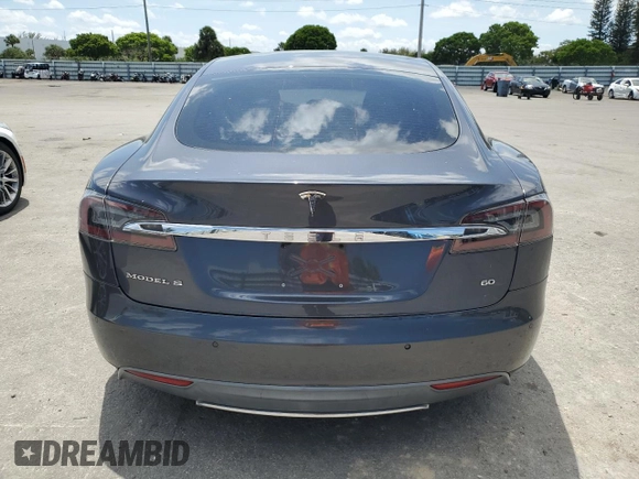 2014 Tesla Model S 60 with VIN 5YJSA1S13EFP63432, listed as a Copart auction lot 56706195 with 114,671 mi miles and Clean Title. Bid and sale history available at DreamBid. Image 6.